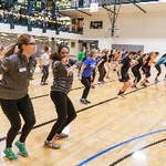 Staff members participating in Zumba class